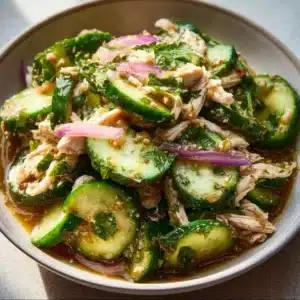 Delicious Thai cucumber salad with chicken served in a bowl