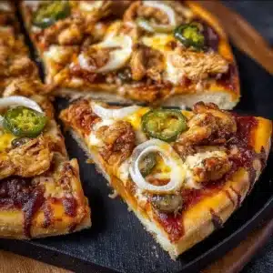 Nashville Hot Chicken Pizza topped with spicy chicken and vibrant toppings