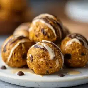 Homemade pumpkin protein balls on a wooden table